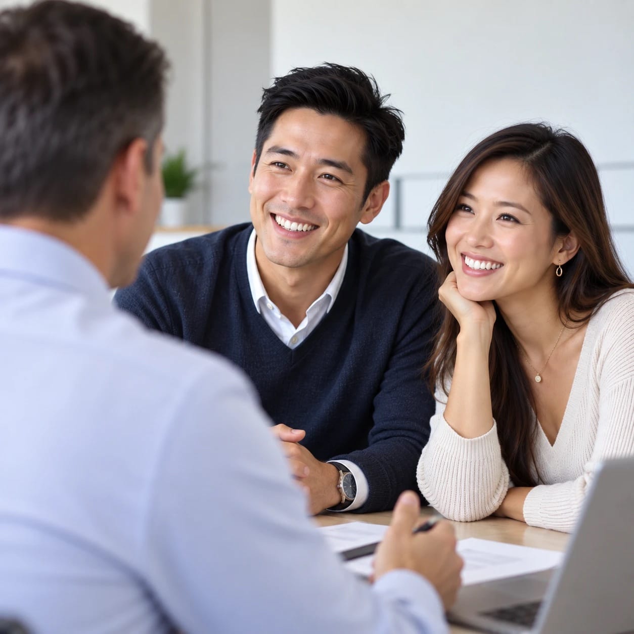 Couple meeting with their real estate agent
