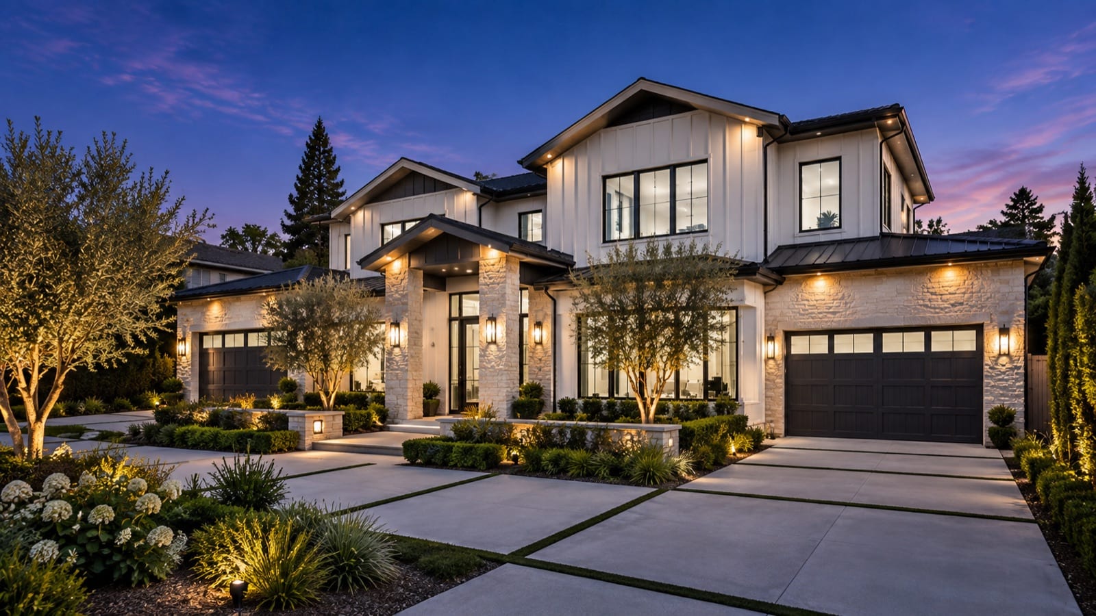 Twilight exterior photograph of a modern farmhouse home